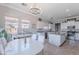 Eat-in kitchen includes a breakfast table, an island, granite countertops, and lots of cabinet space at 1128 E Phelps St, Gilbert, AZ 85295