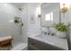 Updated bathroom with marble countertops, modern fixtures, and a glass enclosed shower at 1205 W 7Th St, Tempe, AZ 85281
