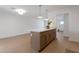 Open kitchen island with counter seating and storage in a light and airy space at 1205 W 7Th St, Tempe, AZ 85281