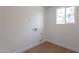 Clean laundry room with wood-look floors, window, and utility hookups ready for appliances at 1205 W 7Th St, Tempe, AZ 85281