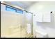 Neat bathroom featuring a shower with a glass door and towel rack at 13280 W Caribbean Ln, Surprise, AZ 85379