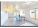 Spacious game room features tiled floors and a ping pong table for recreation at 13280 W Caribbean Ln, Surprise, AZ 85379