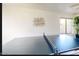 Game room with ping pong table and neutral colored walls, with plenty of natural light at 13280 W Caribbean Ln, Surprise, AZ 85379