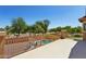 Balcony view overlooking a fenced pool and landscaped neighborhood at 13724 W Luke Ave, Litchfield Park, AZ 85340