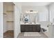 This spacious bathroom has double sinks, a soaking tub and a closet for storage at 13724 W Luke Ave, Litchfield Park, AZ 85340