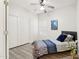 Cozy bedroom showcases a sliding door closet and a comfortable queen-sized bed at 13724 W Luke Ave, Litchfield Park, AZ 85340