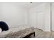 Clean, bright bedroom is furnished with a single bed and has a sliding door closet at 13724 W Luke Ave, Litchfield Park, AZ 85340