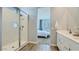 Modern bathroom featuring a glass shower and white vanity at 1516 W Ridge Rd, Apache Junction, AZ 85120
