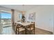 Bright dining room featuring a modern chandelier and neutral decor at 1516 W Ridge Rd, Apache Junction, AZ 85120