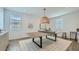 Bright game room with a ping pong table and stylish decor at 1516 W Ridge Rd, Apache Junction, AZ 85120
