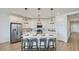 Open-concept kitchen featuring a large island with counter seating at 1516 W Ridge Rd, Apache Junction, AZ 85120