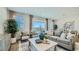 Spacious living room featuring stylish decor and plenty of natural light at 1516 W Ridge Rd, Apache Junction, AZ 85120