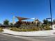 Well-maintained playground with shade structures, landscaping, and easy access from sidewalks at 16035 W Questa Dr, Surprise, AZ 85387