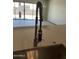 Stylish stainless steel faucet over a large stainless steel kitchen sink with modern countertops at 16035 W Questa Dr, Surprise, AZ 85387