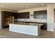 Spacious kitchen with large island, modern cabinets, and granite countertops at 16035 W Questa Dr, Surprise, AZ 85387