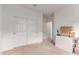Neutral guest bedroom with closet space and lots of extra storage at 16221 W Prickly Pear Trl, Surprise, AZ 85387