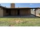 The home has a large covered patio overlooking the yard, providing shade and comfort at 1714 W Villa Rita Dr, Phoenix, AZ 85023