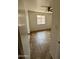Bedroom featuring tile floors, a window, and a ceiling fan at 1714 W Villa Rita Dr, Phoenix, AZ 85023