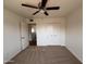 Bedroom featuring carpet, a closet, and a ceiling fan at 1714 W Villa Rita Dr, Phoenix, AZ 85023