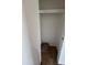 A spacious closet with a shelf above, ready for your organizational needs and personal style at 1714 W Villa Rita Dr, Phoenix, AZ 85023