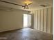 Bright garage interior with an exit door offers convenient access to the outdoors at 1714 W Villa Rita Dr, Phoenix, AZ 85023