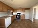 A well-appointed kitchen featuring ample counter space and practical appliances for cooking ease at 1714 W Villa Rita Dr, Phoenix, AZ 85023