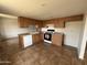 Bright kitchen equipped with modern appliances and plenty of storage cabinets for organization at 1714 W Villa Rita Dr, Phoenix, AZ 85023
