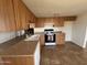 Kitchen featuring appliances and plenty of counter space, perfect for meal preparation and entertaining at 1714 W Villa Rita Dr, Phoenix, AZ 85023