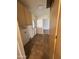 Functional utility room features ample cabinet space, tile floors, and backyard access at 1714 W Villa Rita Dr, Phoenix, AZ 85023