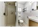 Bathroom featuring shower, toilet, and vanity at 17200 W Bell Rd # 47, Surprise, AZ 85374