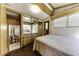 Bedroom boasts a queen-sized bed and large closet at 17200 W Bell Rd # 47, Surprise, AZ 85374