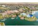 Bird's eye view featuring the community's pool, lake, and meticulously landscaped grounds and lush common areas at 17886 W Brookwood Dr, Goodyear, AZ 85338