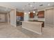 Modern kitchen with granite counters, stainless steel appliances, pendant lighting, and ample cabinet space at 17886 W Brookwood Dr, Goodyear, AZ 85338