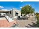Home exterior featuring a backyard with fruit tree, patio area, and accessibility ramp at 205 S Higley Rd # 293, Mesa, AZ 85206
