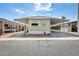 Charming single-story home with covered parking and low-maintenance landscaping at 205 S Higley Rd # 293, Mesa, AZ 85206