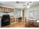 A kitchen and breakfast nook area offers ample counter space, storage, and natural light at 205 S Higley Rd # 293, Mesa, AZ 85206