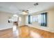 Inviting living room with wood floors, natural light, and view of the kitchen at 205 S Higley Rd # 293, Mesa, AZ 85206