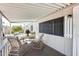 Covered patio area with ample seating for outdoor enjoyment and relaxation at 205 S Higley Rd # 293, Mesa, AZ 85206