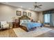 Comfortable main bedroom with an elegant bed frame and nice decor at 21384 E Excelsior Ave, Queen Creek, AZ 85142