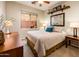 Cozy bedroom with soft decor, natural light from a window and furniture at 2171 E Iris Dr, Chandler, AZ 85286