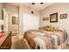 Cozy bedroom features a large closet with white doors and neutral walls at 2171 E Iris Dr, Chandler, AZ 85286