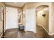 Inviting entryway features tile flooring, a coat rack, and ample space at 2171 E Iris Dr, Chandler, AZ 85286