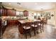 Well-appointed kitchen with granite countertops, a large island, and an adjacent dining area at 2171 E Iris Dr, Chandler, AZ 85286