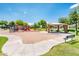 Community playground with picnic tables, slides, and green space at 2171 E Iris Dr, Chandler, AZ 85286