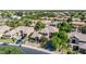 Elevated aerial view of a large home in a neighborhood featuring lush greenery at 2383 E Zion Way, Chandler, AZ 85249