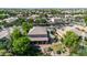 Expansive home featuring a private backyard oasis, covered patio, lush landscaping, and a charming pond at 2383 E Zion Way, Chandler, AZ 85249