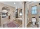 Primary bathroom with spa tub, walk in shower, tile floor, toilet, and dual sink vanity at 2383 E Zion Way, Chandler, AZ 85249