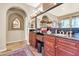 This bathroom features dual sinks, granite countertops, and custom cabinetry at 2383 E Zion Way, Chandler, AZ 85249