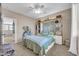 Guest bedroom with light walls, carpet, and views of the front yard at 2383 E Zion Way, Chandler, AZ 85249