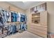 Walk-in closet with extensive shelving, drawers, hanging space, and plenty of storage at 2383 E Zion Way, Chandler, AZ 85249
